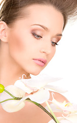 Image showing beautiful woman with white flower