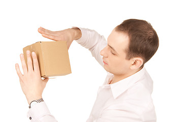 Image showing businessman with parcel