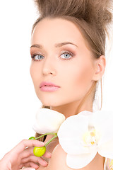 Image showing beautiful woman with white flower