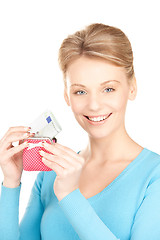 Image showing lovely woman with purse and money