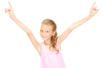 Image showing happy girl showing devil horns gesture