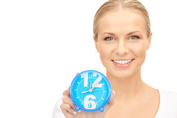 Image showing woman holding alarm clock