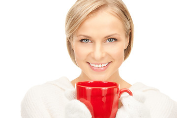 Image showing beautiful woman with red mug