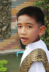 Image showing Boy in traditional dress during a parade in Phuket, Thailand - E