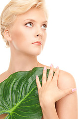 Image showing woman with green leaf