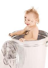 Image showing baby in trash can