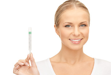 Image showing attractive female doctor with thermometer