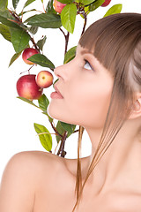 Image showing lovely woman with apple twig