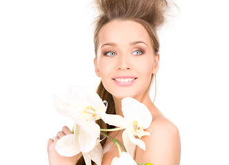 Image showing beautiful woman with white flower