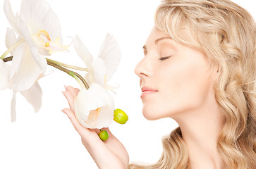 Image showing beautiful woman with white flower