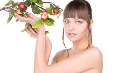 Image showing lovely woman with apple twig