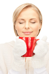 Image showing beautiful woman with red mug