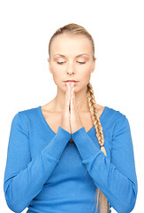 Image showing praying businesswoman