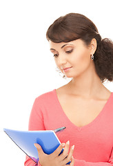 Image showing young attractive businesswoman with notebook