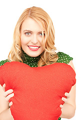 Image showing woman with red heart-shaped pillow