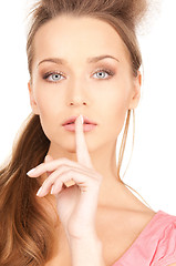 Image showing finger on lips