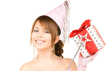 Image showing teenage party girl with magic wand and gift box