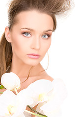 Image showing beautiful woman with white flower