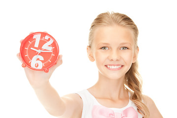 Image showing girl holding alarm clock