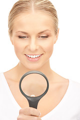 Image showing woman with magnifying glass