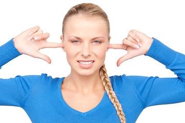 Image showing woman with fingers in ears