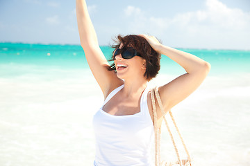Image showing happy woman at the beach