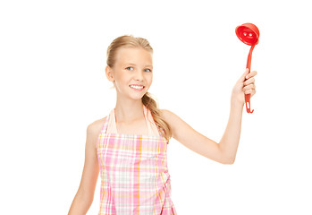Image showing little housewife with red ladle