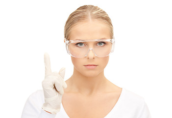 Image showing woman in protective glasses and gloves