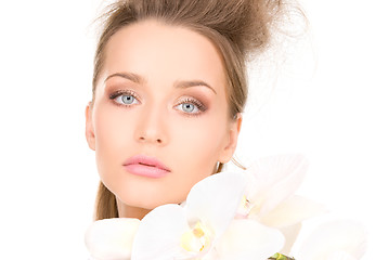 Image showing beautiful woman with white flower