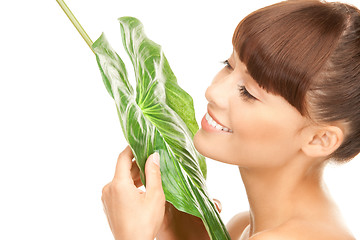 Image showing woman with green leaf