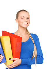 Image showing young attractive businesswoman with folders