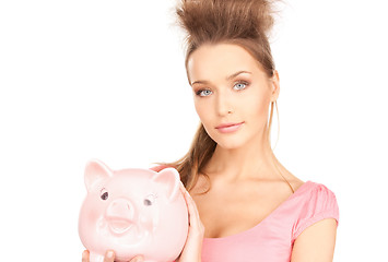 Image showing lovely woman with piggy bank