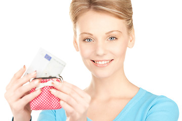 Image showing lovely woman with purse and money