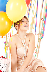 Image showing party girl with balloons and gift box