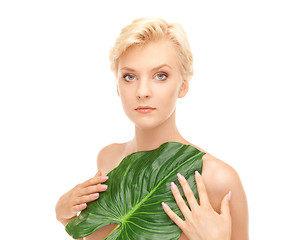 Image showing woman with green leaf