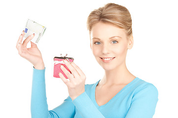 Image showing lovely woman with purse and money