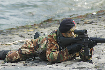 Image showing Soldier with gun