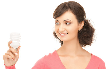 Image showing woman holding energy saving bulb