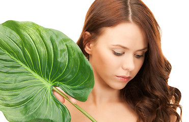 Image showing woman with green leaf