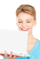 Image showing happy woman with laptop computer