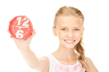 Image showing girl holding alarm clock