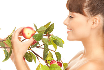 Image showing happy woman with apple twig