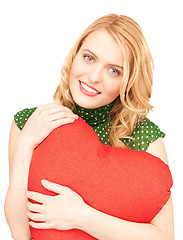 Image showing woman with red heart-shaped pillow