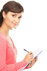 Image showing young attractive businesswoman with notebook