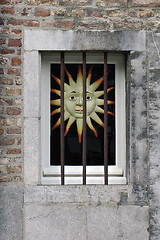Image showing Sun behind bars