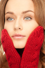 Image showing beautiful woman in red mittens 