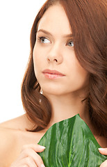 Image showing woman with green leaf