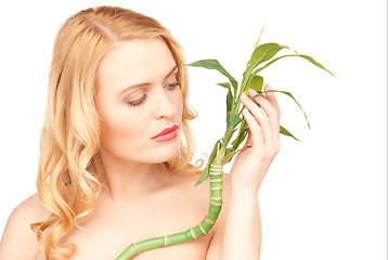 Image showing woman with sprout over white