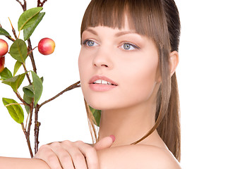 Image showing lovely woman with apple twig