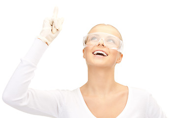 Image showing woman in protective glasses and gloves